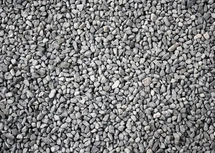 Close-up texture of drainage rock ready for screening