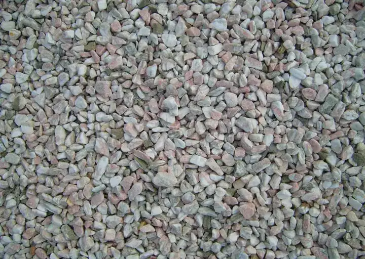 Close-up texture of pea gravel ready for screening