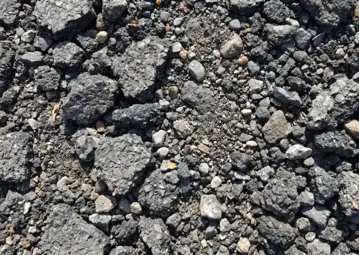 Close-up texture of recycled asphalt ready for screening